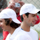 Rafa Nadal junto al serbio Djokovic en un entrenamiento.
