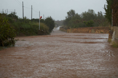 Vista general de los caminos cortados debido a las lluvias torrenciales que afectan a la Comunitat Valenciana, y especialmente a la provincia de Valencia.