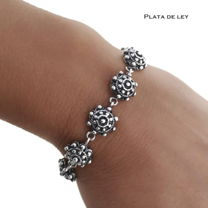 El botón charro se adapta a joyas contemporáneas sin perder su simbolismo protector